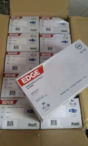 Cranberry Evolve 300 Nitrile Powder Free Examination Gloves by AM GLOBAL SUPPLY INC