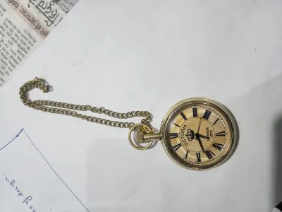 Metal tortoise pocket watch necklace by JewelrySaga