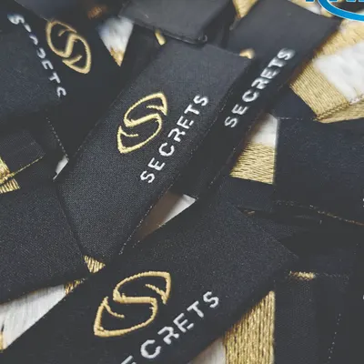 Custom Woven Labels for Clothing | Premium Garment Labels Manufacturer by KRISHNA LABELS INC.