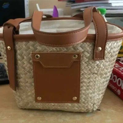 Seagrass Handbag by VIGI FARM PRODUCTION COMPANY LIMITED