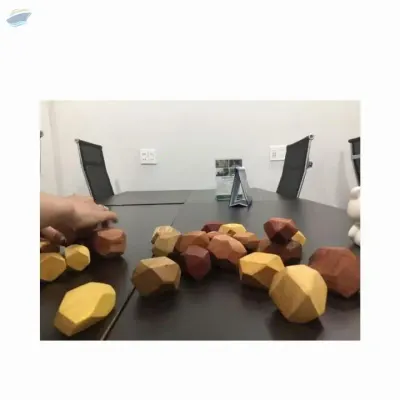 Wooden Balance Rock by 99 Gold Data Processing Trading Company Limited
