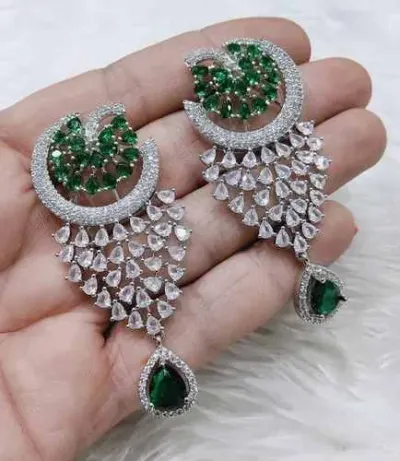 Coconut shell earrings by Miral India