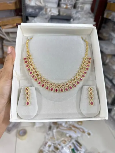 Coloured coconut shell necklace with earrings by Miral India