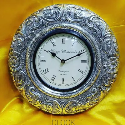 Sea shell clocks by Valampuri Impex