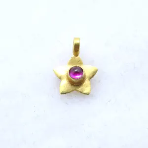 Beautiful handmade star 18k solid gold charm by Gemsicon Private Limited