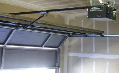 Light duty rolling door operator