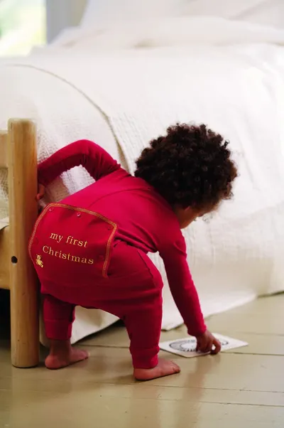 Baby body long sleeve suit by Assisi Garments