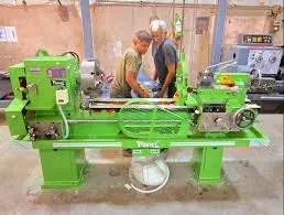Profile wrapping machine by Qingdao H&c Woodworking Machinery Co., Ltd