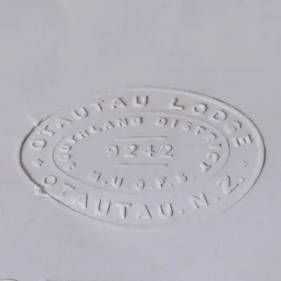 Embossed jeans leather label