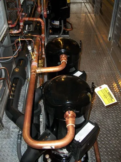 Swimming pool heat pump