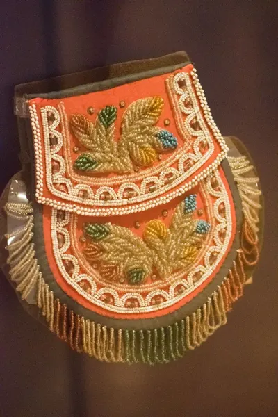Embroidered golden cintemani plate