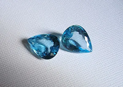 Carved Swiss Blue Topaz Gemstone Pair