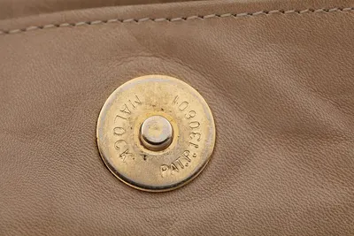 Tooling Leather Clutch by HideCare Enterprises