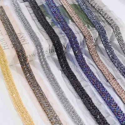 Sequin roll (lace) by Wuxi Tiger Thread Accessories Co., Ltd