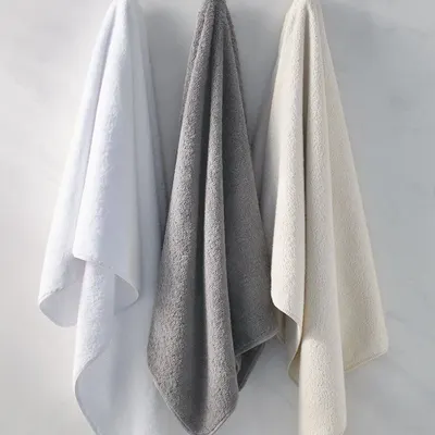 Monochromatic plastic shower towel