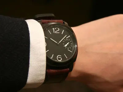 Wall Wooden Watch In Dark Brown & Red Color by Skyline Services